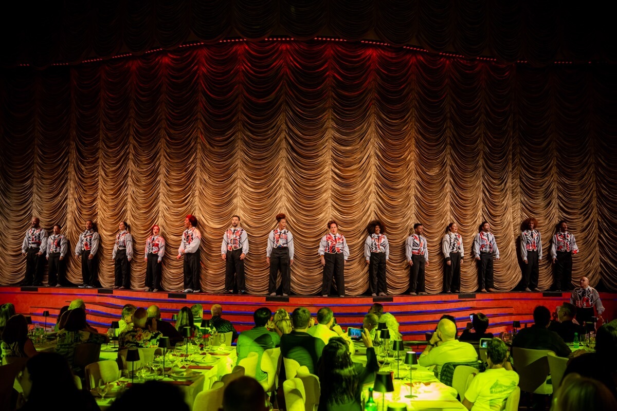 Dancers on stage at the Roxy Dinner Show seen from the dining room